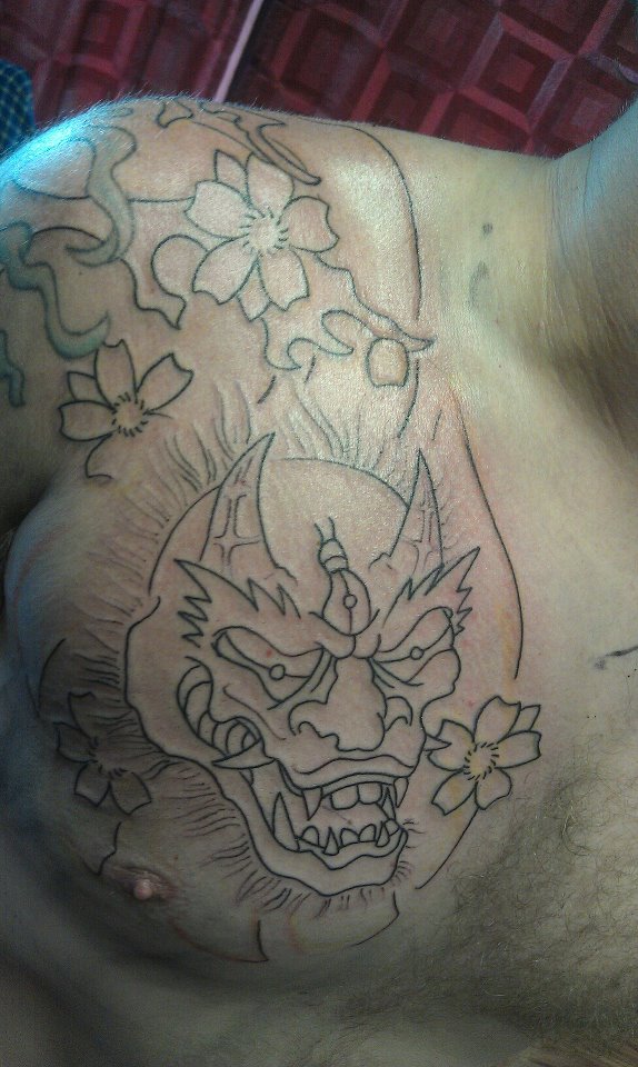 Oni Japanese devil tattoo with cherry blossoms we started on Patrick