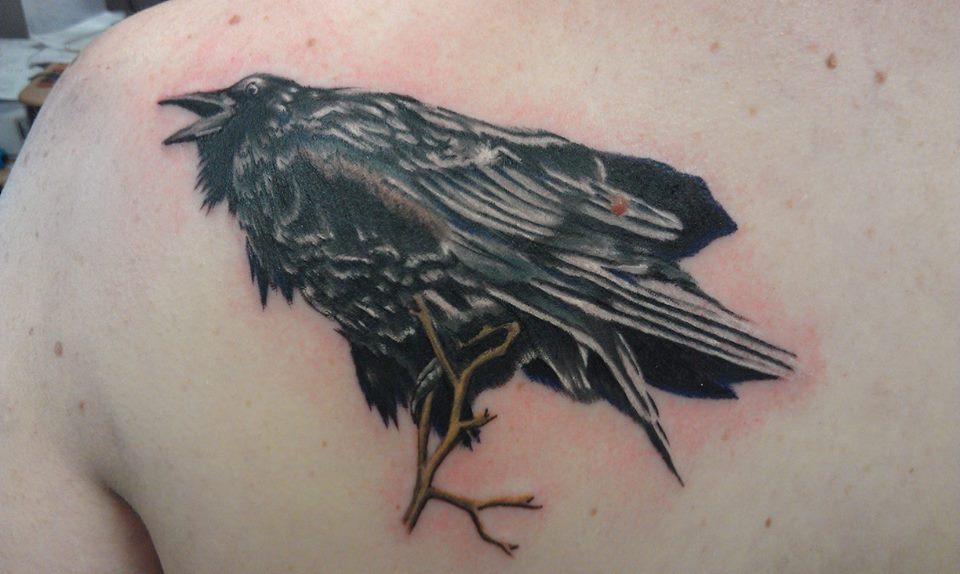 raven tattoo chest